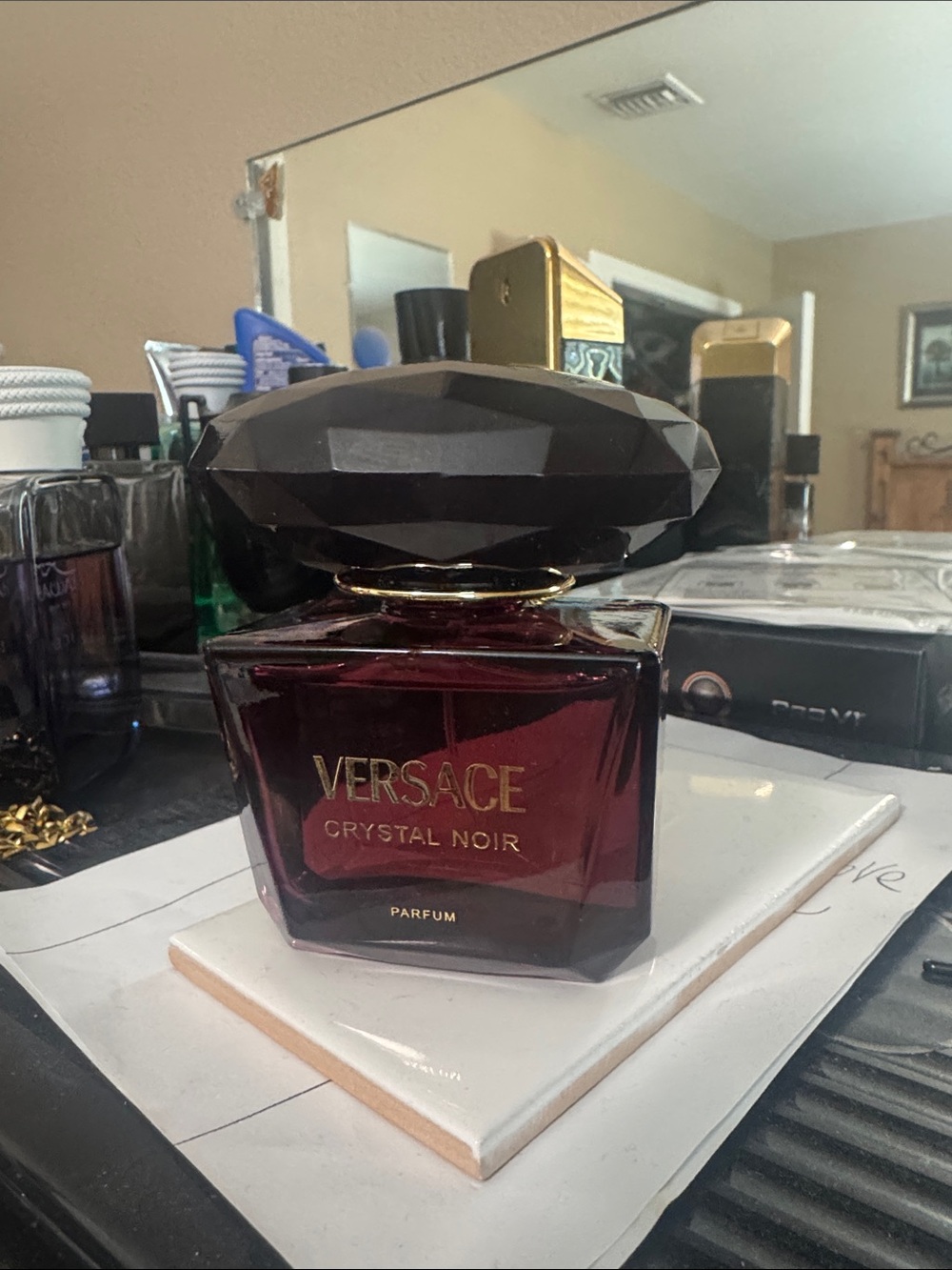 Versace Crystal Noir Parfum - Deep Burgundy and Black Bottle